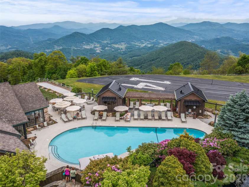 81 Creekside Way, Burnsville, NC 28714.  MLS# CAR4374251, YatesRealty ID 16129. MOUNTAIN AIR POOL