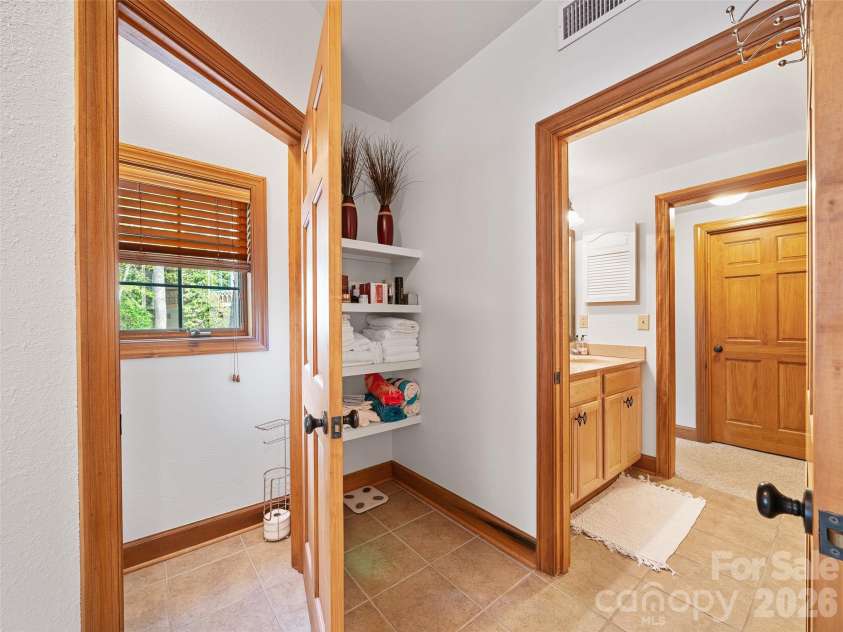 81 Creekside Way, Burnsville, NC 28714.  MLS# CAR4374251, YatesRealty ID 16129. Primary Bath Private Toilet room