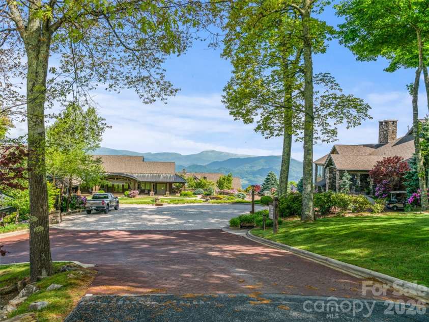 81 Creekside Way, Burnsville, NC 28714.  MLS# CAR4374251, YatesRealty ID 16129. Spectacular Long range Mountain views everywhere you look