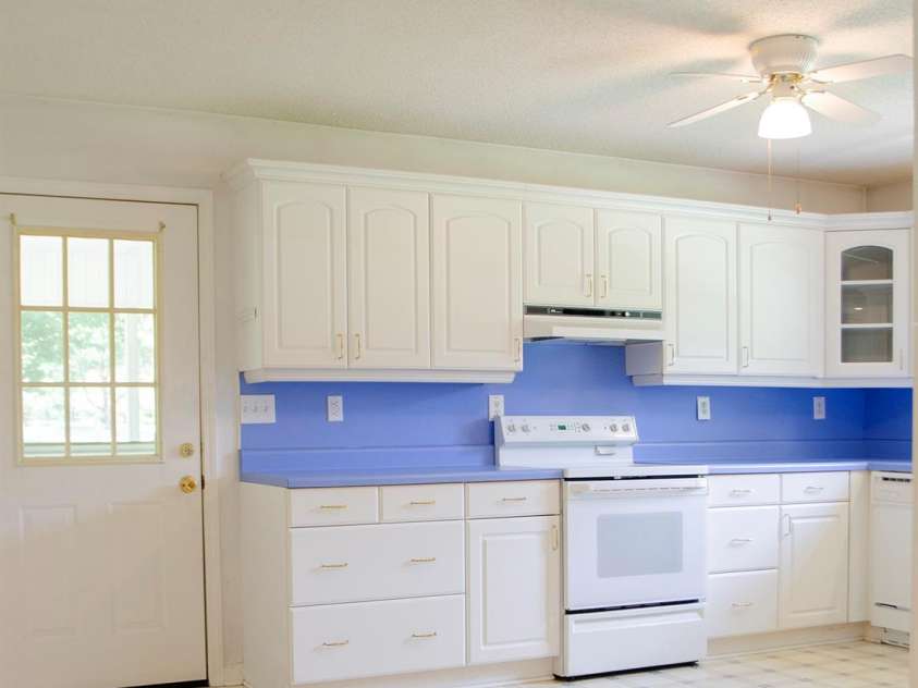 452 Mocksville Highway, Statesville, NC 28625.  MLS# CAR4170218, YatesRealty ID 1613. Kitchen/Door to Carport