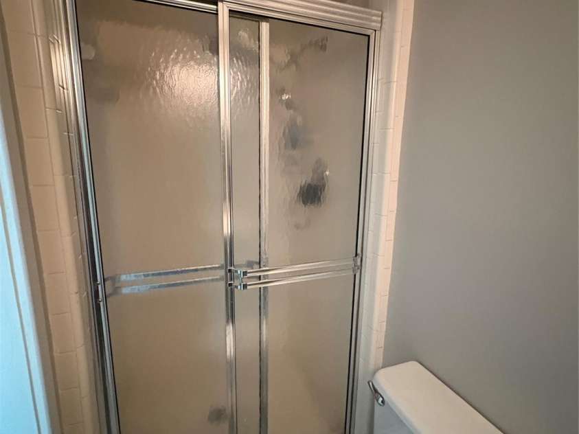 223 Forest Drive, Greenwood, SC 29646.  MLS# CAR4264303, YatesRealty ID 16134. Shower in primary bathroom