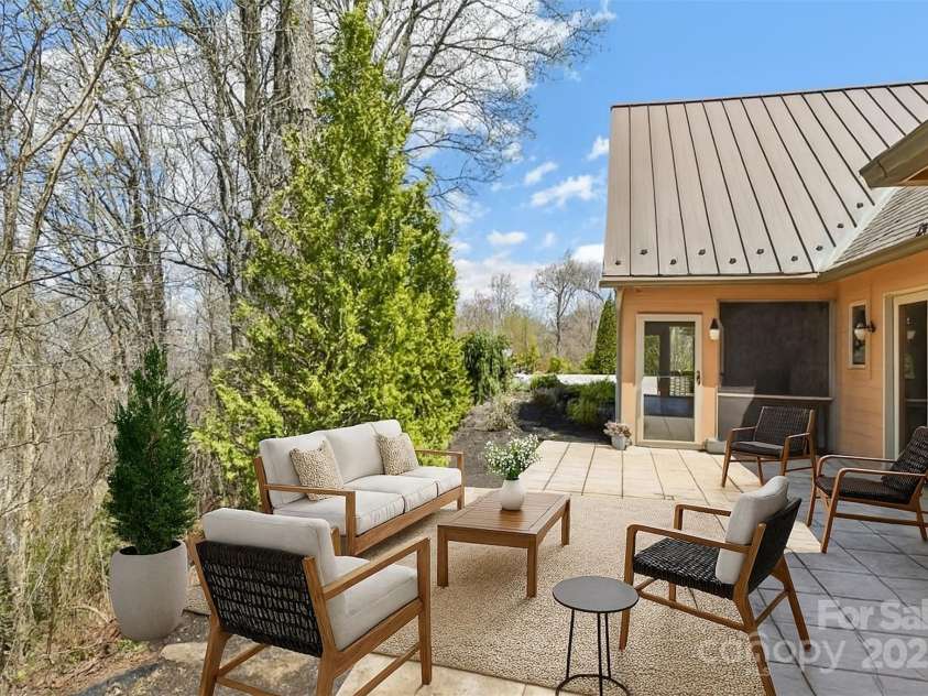 206 View Ridge Parkway, Leicester, NC 28748.  MLS# CAR4228261, YatesRealty ID 16135. Back Deck Virtually Staged