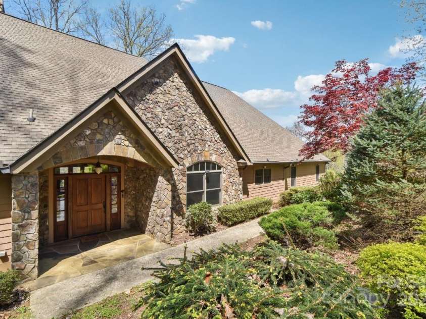 206 View Ridge Parkway, Leicester, NC 28748.  MLS# CAR4228261, YatesRealty ID 16135. Enjoy luxury and main-level living, all surrounded by serene views—comfort and beauty in perfect balance