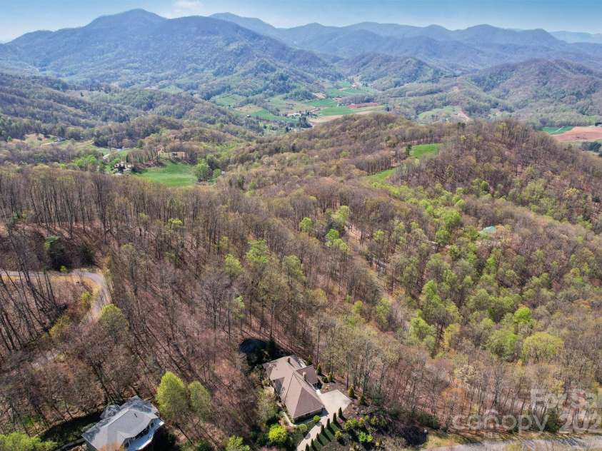 206 View Ridge Parkway, Leicester, NC 28748.  MLS# CAR4228261, YatesRealty ID 16135. Tucked into the tranquil beauty of Blue Mist Farms, your dream home awaits