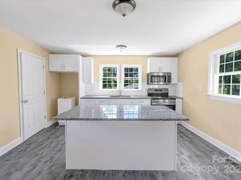 921 1st Street, Lowell, NC 28098.  MLS# CAR4263355, YatesRealty ID 16136. 