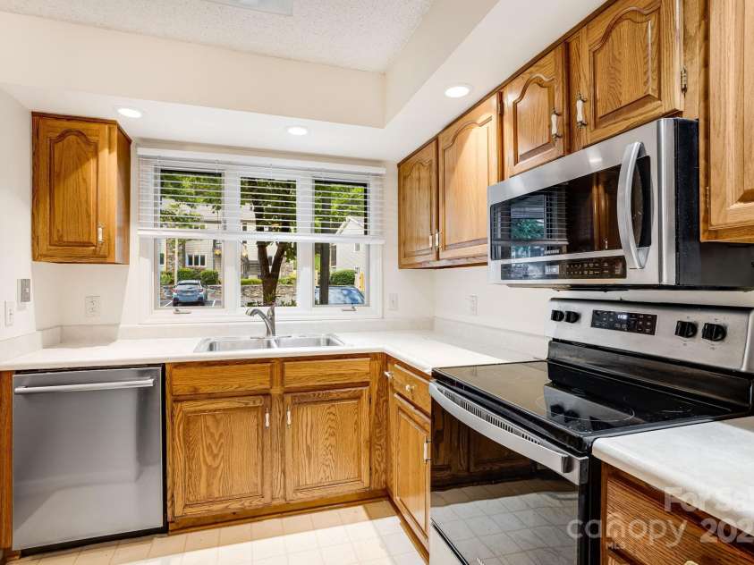 411 Britton Creek Drive, Hendersonville, NC 28791.  MLS# CAR4244943, YatesRealty ID 16139. 
