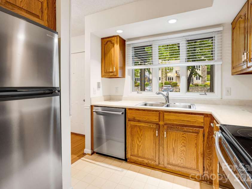 411 Britton Creek Drive, Hendersonville, NC 28791.  MLS# CAR4244943, YatesRealty ID 16139. 