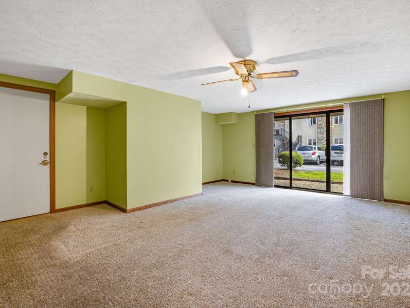 411 Britton Creek Drive, Hendersonville, NC 28791.  MLS# CAR4244943, YatesRealty ID 16139. 
