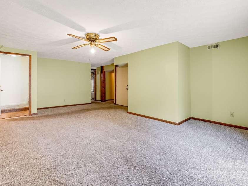 411 Britton Creek Drive, Hendersonville, NC 28791.  MLS# CAR4244943, YatesRealty ID 16139. 