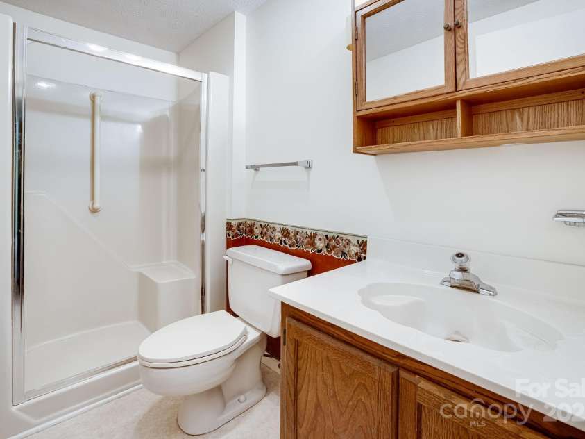 411 Britton Creek Drive, Hendersonville, NC 28791.  MLS# CAR4244943, YatesRealty ID 16139. 