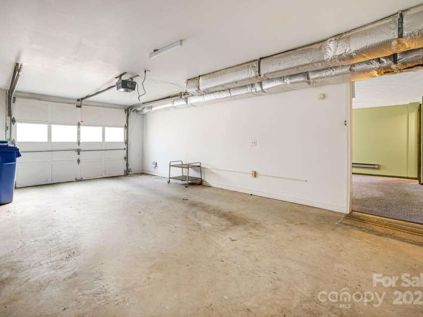 411 Britton Creek Drive, Hendersonville, NC 28791.  MLS# CAR4244943, YatesRealty ID 16139. 