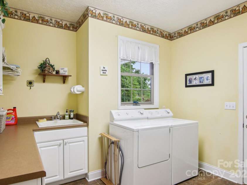 310 Jonathan Creek Drive, Etowah, NC 28729.  MLS# CAR4258575, YatesRealty ID 16140. 