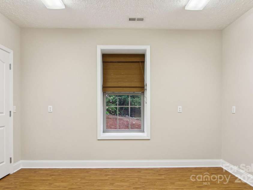310 Jonathan Creek Drive, Etowah, NC 28729.  MLS# CAR4258575, YatesRealty ID 16140. Bonus room, perfect for office or guest bedroom