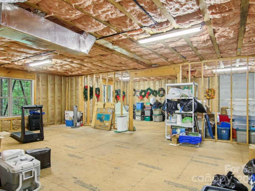 310 Jonathan Creek Drive, Etowah, NC 28729.  MLS# CAR4258575, YatesRealty ID 16140. Unfinished basement offers generous storage, expansion opportunities