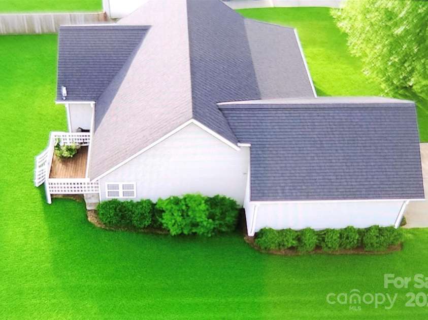 201 Tarrington Drive, Statesville, NC 28625.  MLS# CAR4293154, YatesRealty ID 1615. Lot size approximate. Edited with AI.