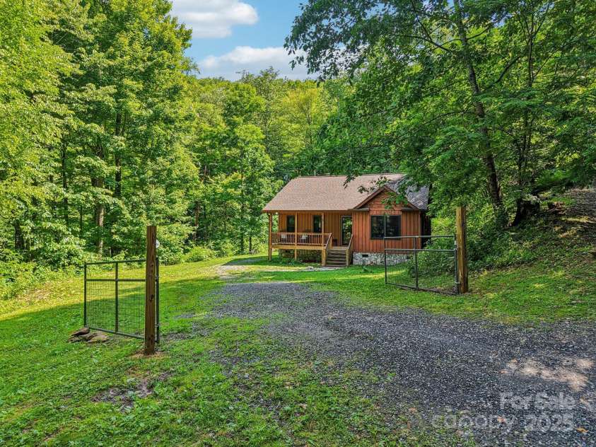 2171 Black Rock Road, Cherokee, NC 28719.  MLS# CAR4270256, YatesRealty ID 1615. Front of home with driveway