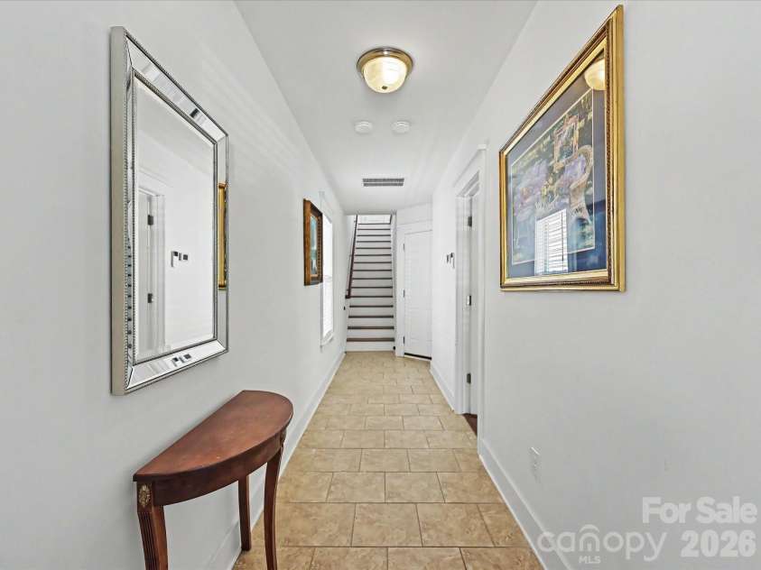 347 Spring Street, Davidson, NC 28036.  MLS# CAR4362683, YatesRealty ID 16152. Entrance from the lower level