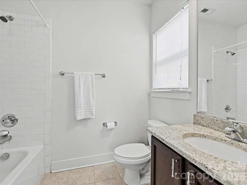 347 Spring Street, Davidson, NC 28036.  MLS# CAR4362683, YatesRealty ID 16152. Full bathroom on the upper level with tub/shower combination
