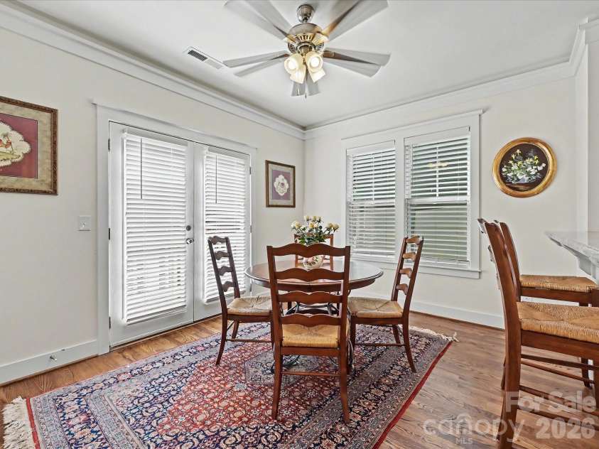 347 Spring Street, Davidson, NC 28036.  MLS# CAR4362683, YatesRealty ID 16152. Light-filled breakfast room with doors to the balcony