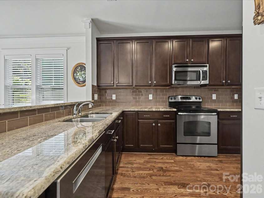 347 Spring Street, Davidson, NC 28036.  MLS# CAR4362683, YatesRealty ID 16152. Spacious kitchen on the main level