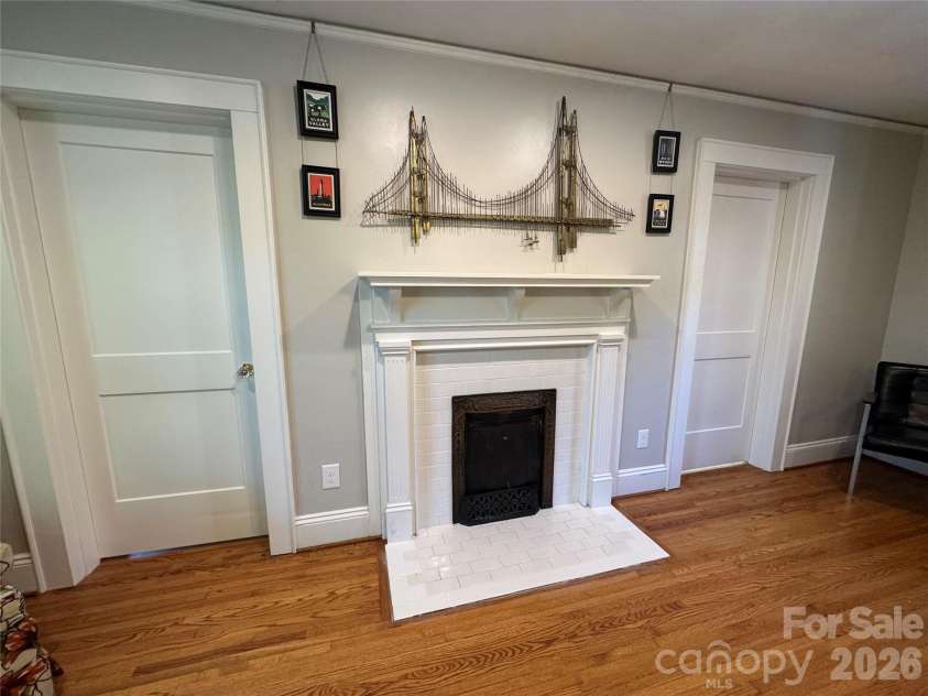 70 Washington Lane, Concord, NC 28025.  MLS# CAR4371911, YatesRealty ID 16153. Fireplace in Primary bedroom