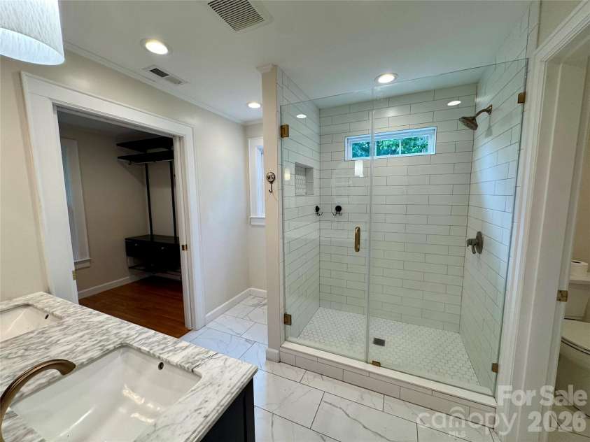 70 Washington Lane, Concord, NC 28025.  MLS# CAR4371911, YatesRealty ID 16153. Primary bathroom