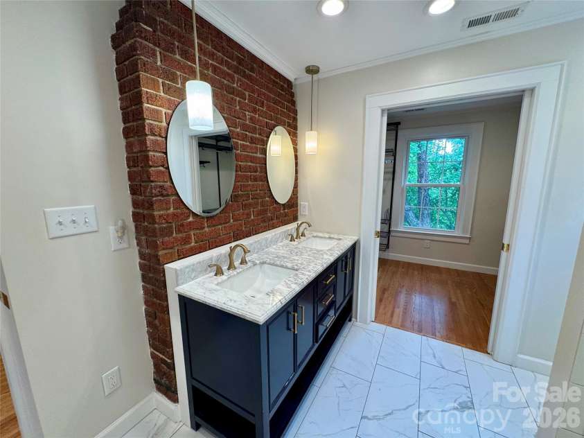 70 Washington Lane, Concord, NC 28025.  MLS# CAR4371911, YatesRealty ID 16153. Primary bathroom