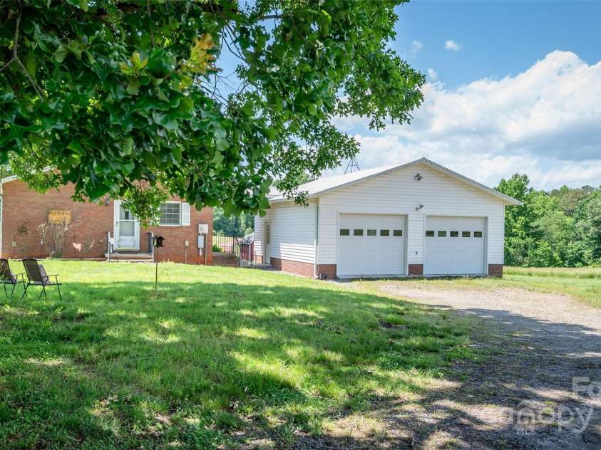 765 York Institute Road, Hiddenite, NC 28636.  MLS# CAR4260914, YatesRealty ID 16153. Detached garage with breezeway