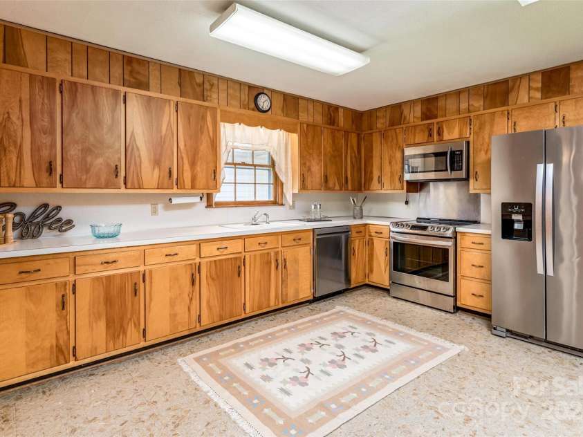 765 York Institute Road, Hiddenite, NC 28636.  MLS# CAR4260914, YatesRealty ID 16153. Large kitchen with many possibilities.