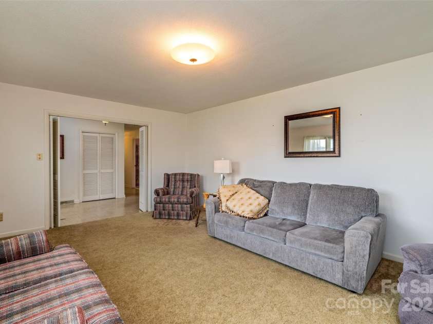 765 York Institute Road, Hiddenite, NC 28636.  MLS# CAR4260914, YatesRealty ID 16153. Large living room