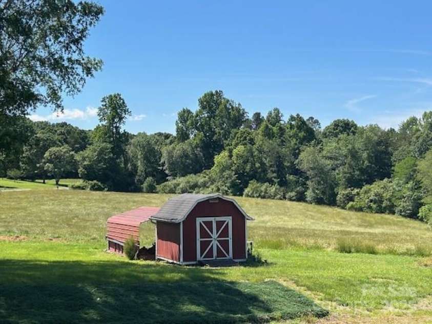 765 York Institute Road, Hiddenite, NC 28636.  MLS# CAR4260914, YatesRealty ID 16153. Outbuilding and view to NW of house.