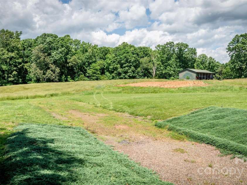 765 York Institute Road, Hiddenite, NC 28636.  MLS# CAR4260914, YatesRealty ID 16153. Picturesque setting