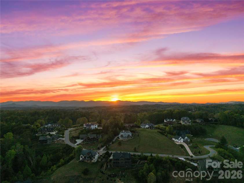 28 Gracie Lane, Weaverville, NC 28787.  MLS# CAR4361054, YatesRealty ID 16155. Where elevated design meets unforgettable mountain sunsets.