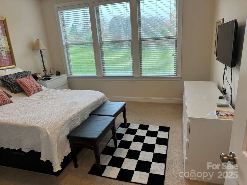 129 Johnson Manor Street, Mooresville, NC 28115.  MLS# CAR4197024, YatesRealty ID 16157. First floor suite looking out to maniucured lawn
