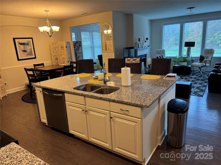 129 Johnson Manor Street, Mooresville, NC 28115.  MLS# CAR4197024, YatesRealty ID 16157. Kitchen facing bonus and gathering space