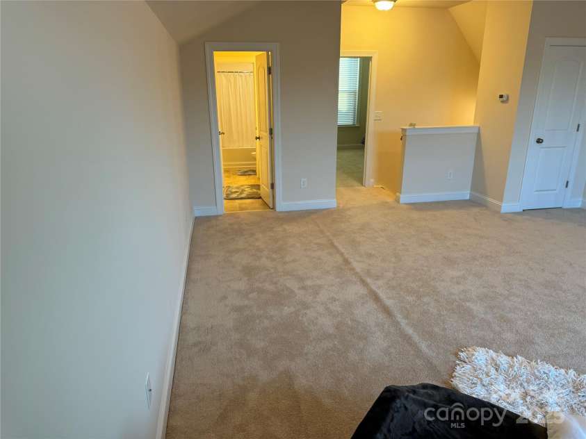129 Johnson Manor Street, Mooresville, NC 28115.  MLS# CAR4197024, YatesRealty ID 16157. View from community towards  2nd level   bedroom & bathroom