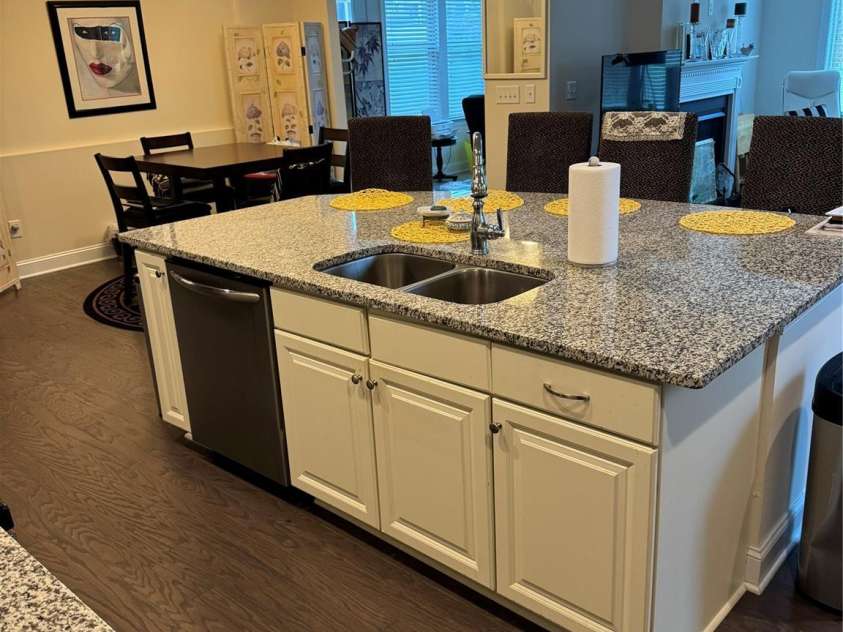 129 Johnson Manor Street, Mooresville, NC 28115.  MLS# CAR4197024, YatesRealty ID 16157. View from kitchen to bedroom suite and bonus room