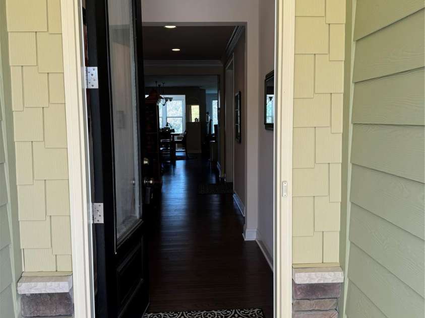 129 Johnson Manor Street, Mooresville, NC 28115.  MLS# CAR4197024, YatesRealty ID 16157. View thru front door down main entry hall