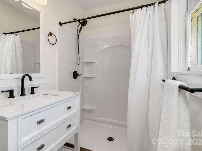 122 Old Nc 63 Highway, Leicester, NC 28748.  MLS# CAR4249489, YatesRealty ID 16160. Master Bathroom & walkin shower