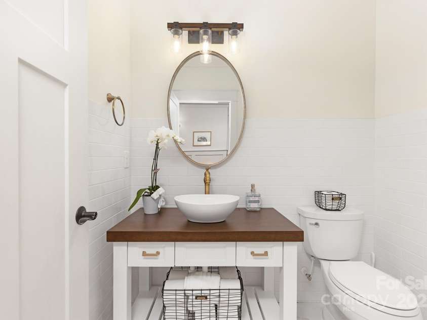 102 Antioch Plantation Drive, Matthews, NC 28104.  MLS# CAR4263408, YatesRealty ID 16162. Half bathroom