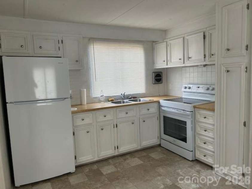 621 Elm Street, Marshville, NC 28103.  MLS# CAR4337317, YatesRealty ID 16163. Kitchen 