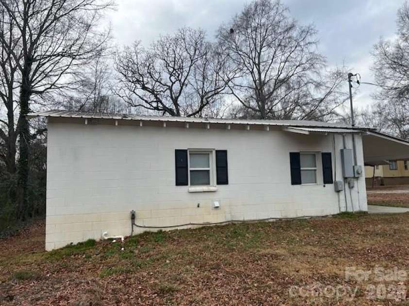621 Elm Street, Marshville, NC 28103.  MLS# CAR4337317, YatesRealty ID 16163. Side iew