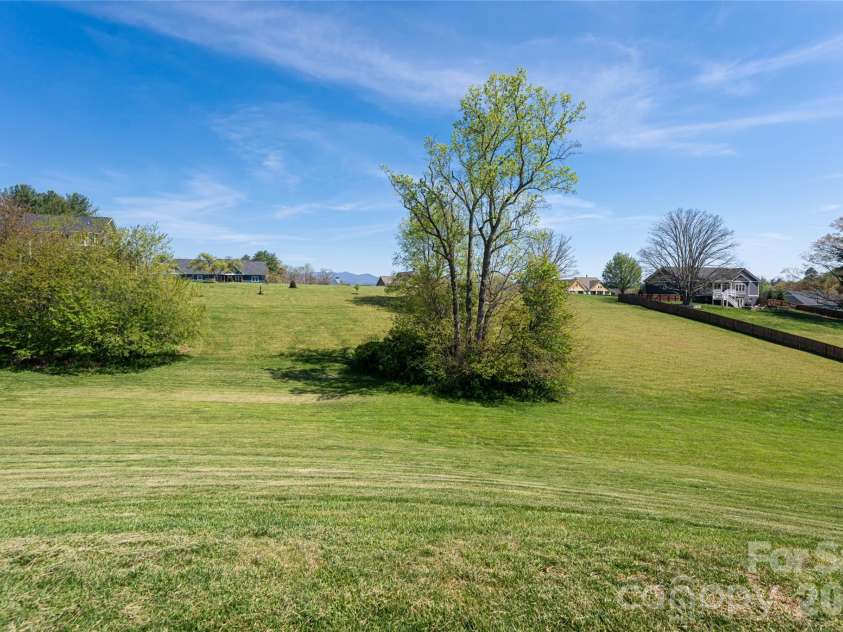 12 Horizon View Lane, Alexander, NC 28701.  MLS# CAR4373999, YatesRealty ID 16165. Large backyard
