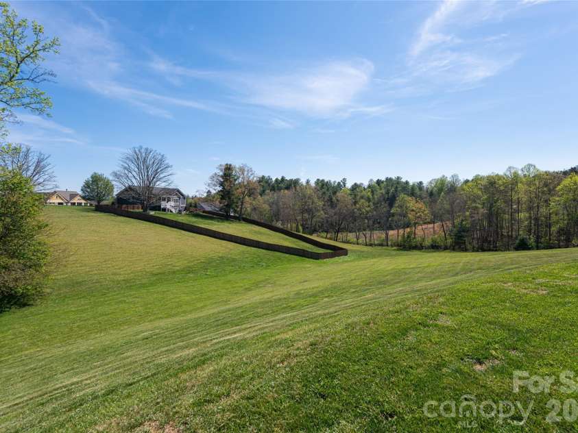 12 Horizon View Lane, Alexander, NC 28701.  MLS# CAR4373999, YatesRealty ID 16165. Large backyard
