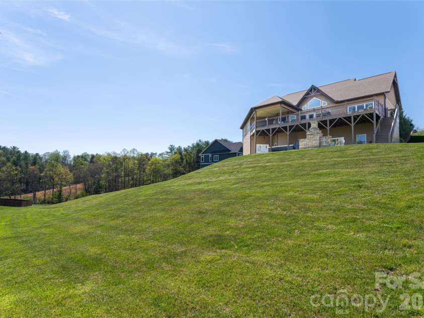 12 Horizon View Lane, Alexander, NC 28701.  MLS# CAR4373999, YatesRealty ID 16165. Large backyard