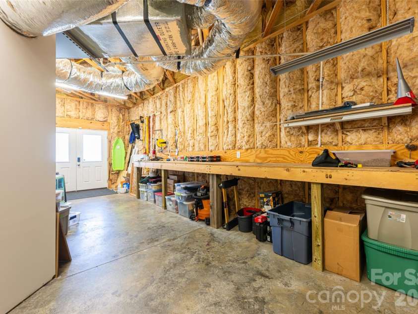 12 Horizon View Lane, Alexander, NC 28701.  MLS# CAR4373999, YatesRealty ID 16165. Lower Level storage and workshop