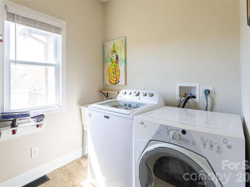 12 Horizon View Lane, Alexander, NC 28701.  MLS# CAR4373999, YatesRealty ID 16165. Main level laundry room