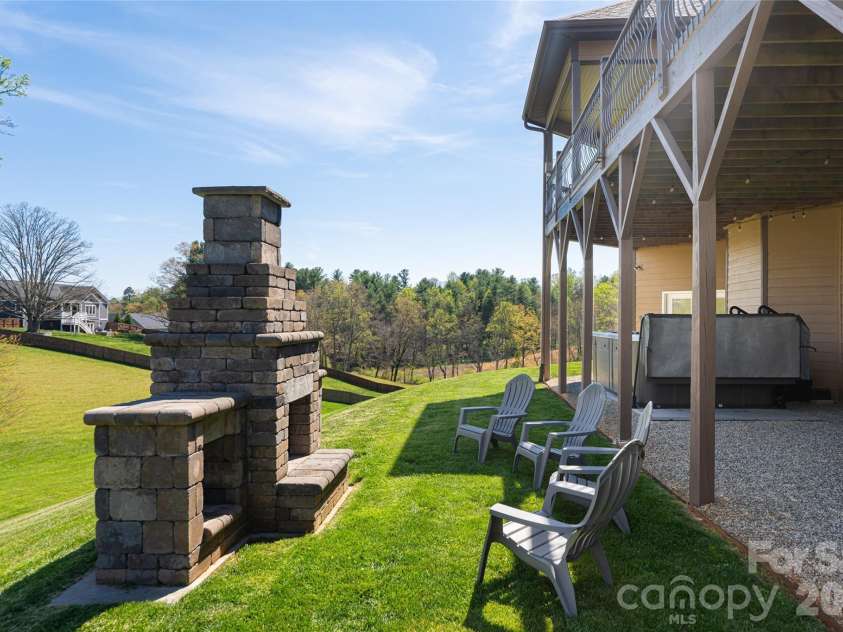 12 Horizon View Lane, Alexander, NC 28701.  MLS# CAR4373999, YatesRealty ID 16165. Outdoor fireplace