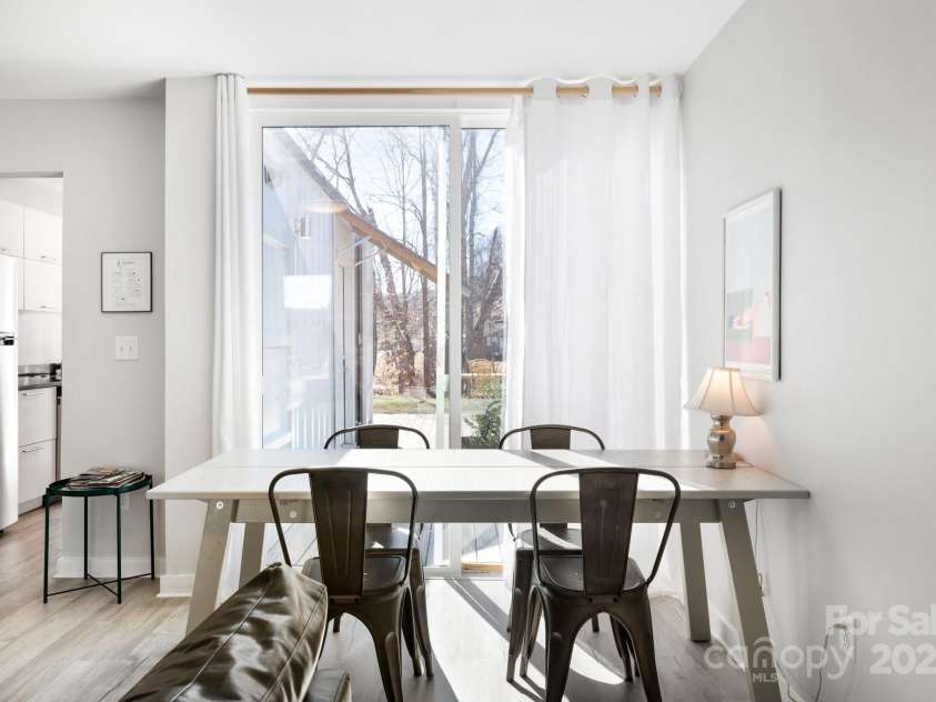 117 Commerce Street, Old Fort, NC 28762.  MLS# CAR4257223, YatesRealty ID 16167. Pre-Helene: Two Dining Spaces