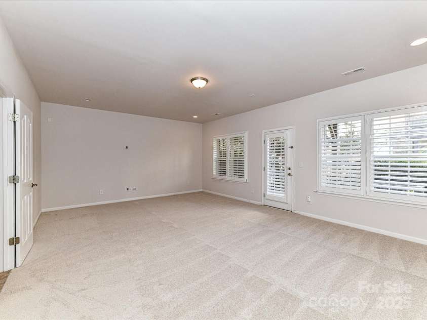 7854 Springs Village Lane, Charlotte, NC 28226.  MLS# CAR4240846, YatesRealty ID 16170. Access to Lower Level Patio